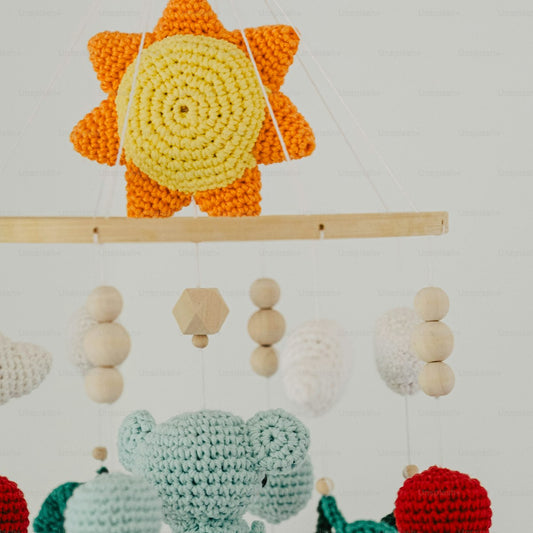 Crocheted jellyfish nursery mobile